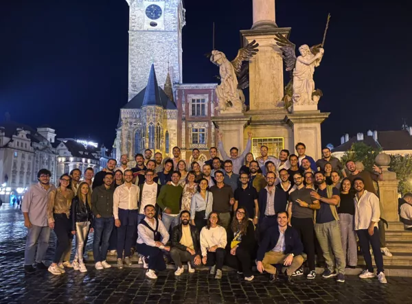 A group of young urologists seated and standing