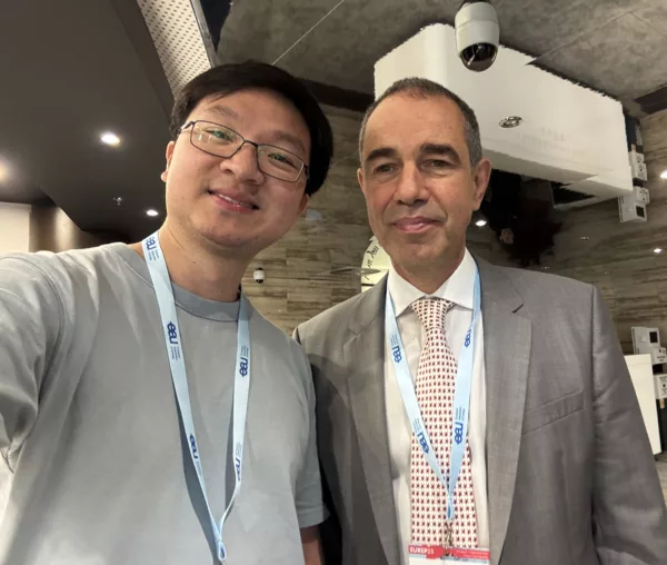Young urologist stands next to a seasoned urologist