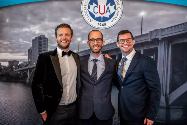 3 men in suits